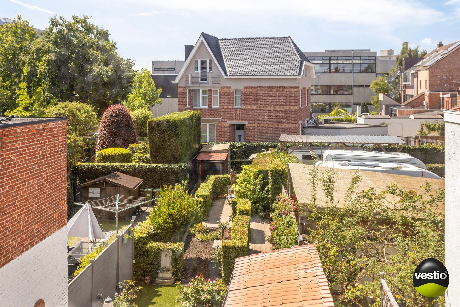 Schitterend gelegen stadswoning met grote tuin en mogelijkheid tot aankoop garagebox! foto 21