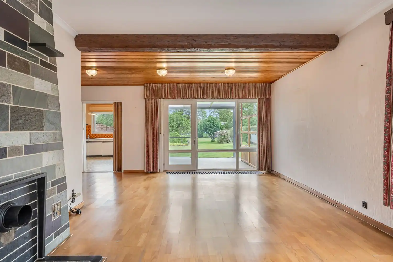 Goed gelegen woning met 4 slaapkamers, een garage en een diepe tuin in een verkeersluwe straat te Kessel-Lo! foto 5