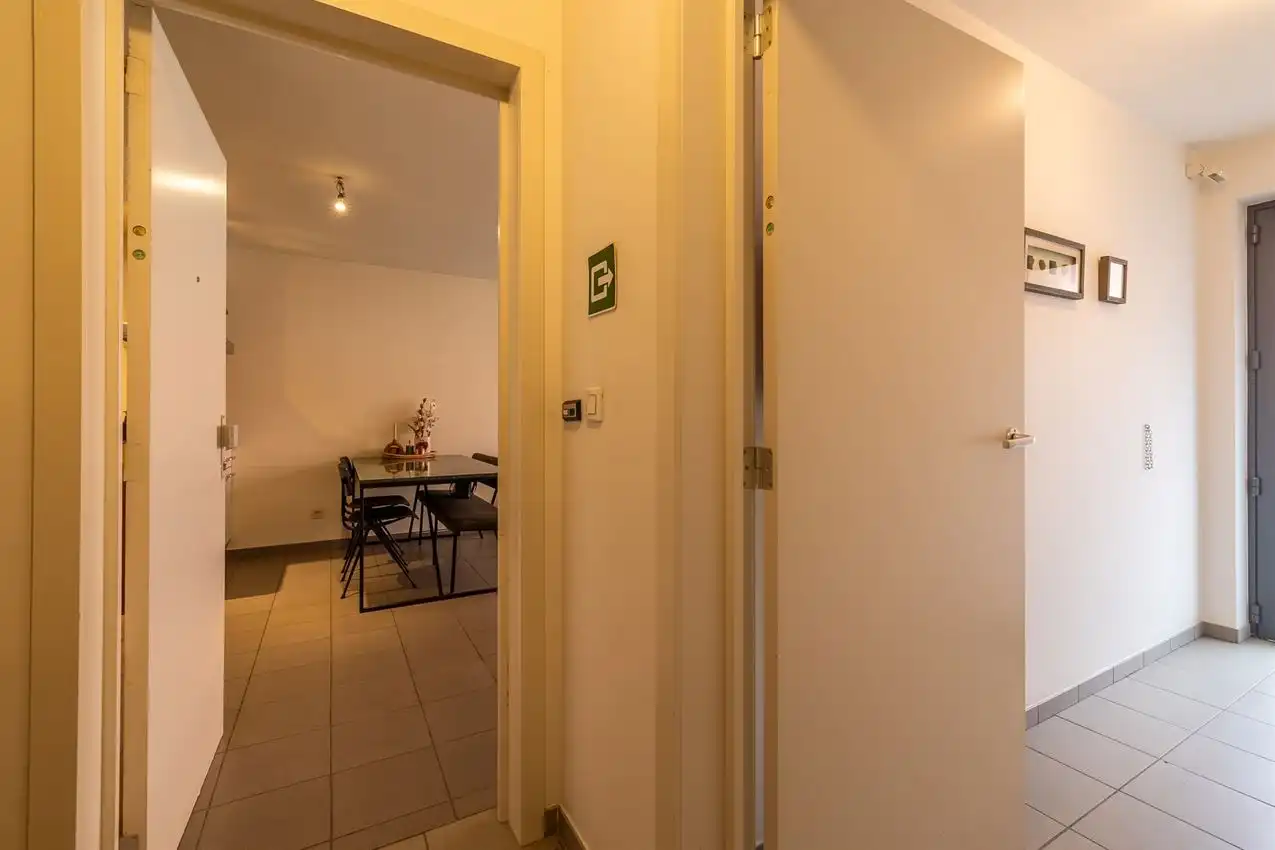 Gelijkvloers appartement met twee slaapkamers en autostaanplaats foto 24