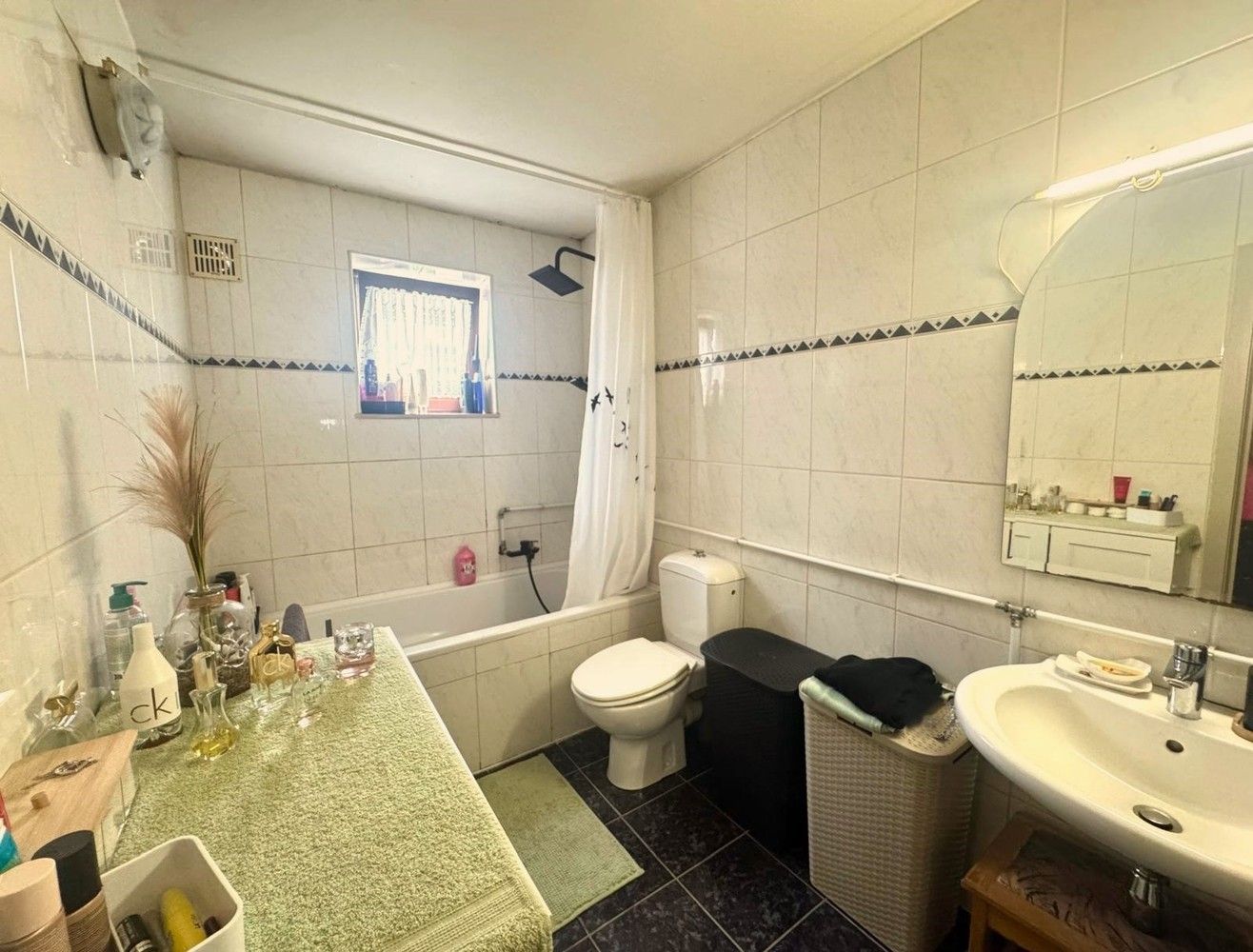 Charmante woning (H.O.B) met terras en tuin foto 8