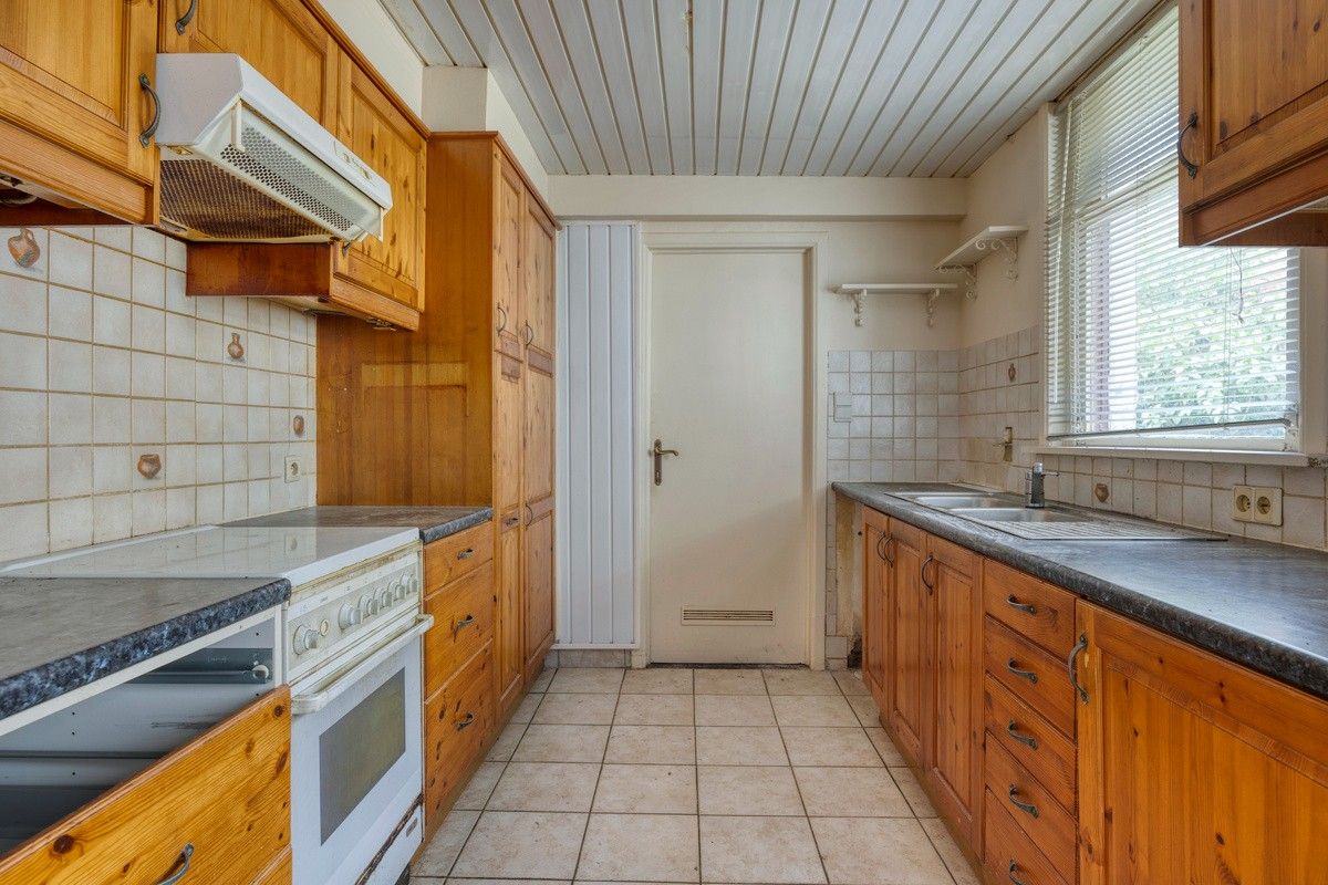 RUIME EN RUSTIG GELEGEN GEZINSWONING | 4 SLPKS - GARAGE - TUIN | TE RENOVEREN foto 8