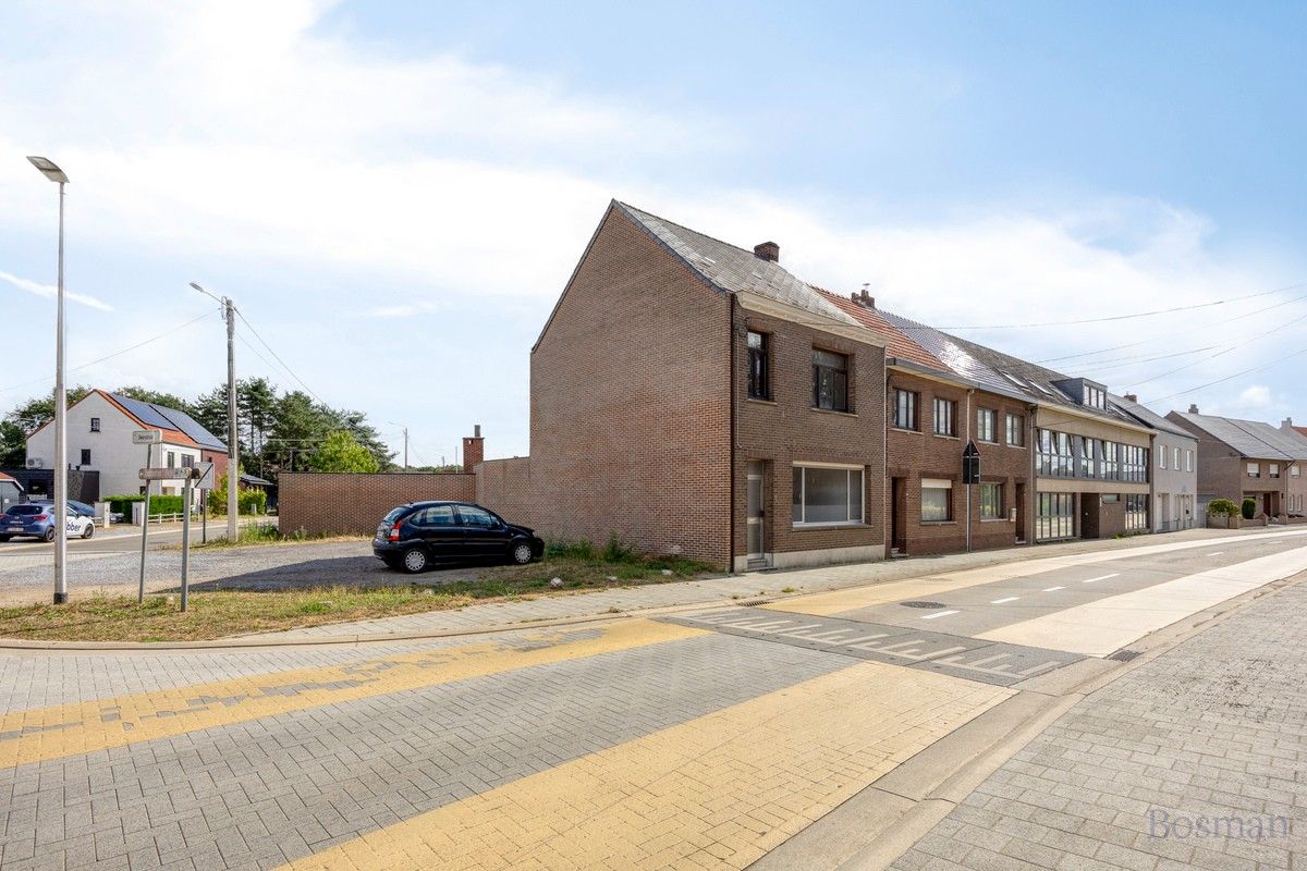 Halfopen bebouwing met 5 garageboxen te koop in Ham foto 30