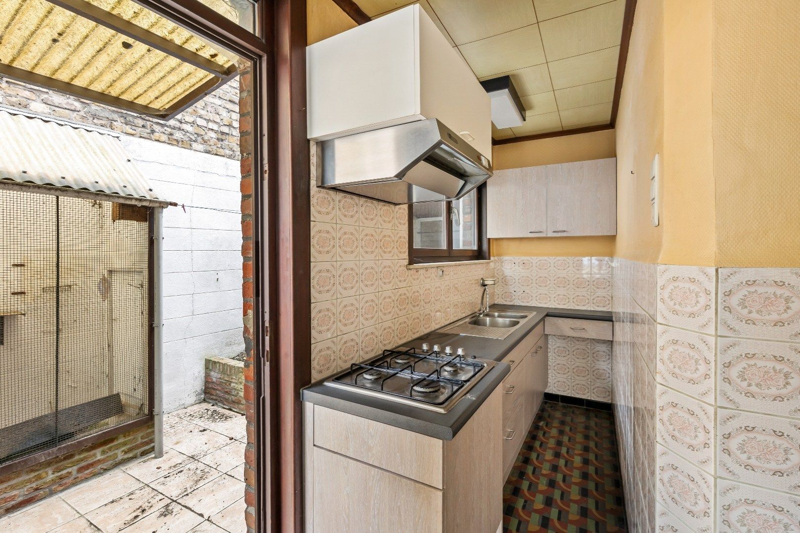 Gezellige stadswoning met 4 slaapkamers, ruime garage en koertje. foto 14