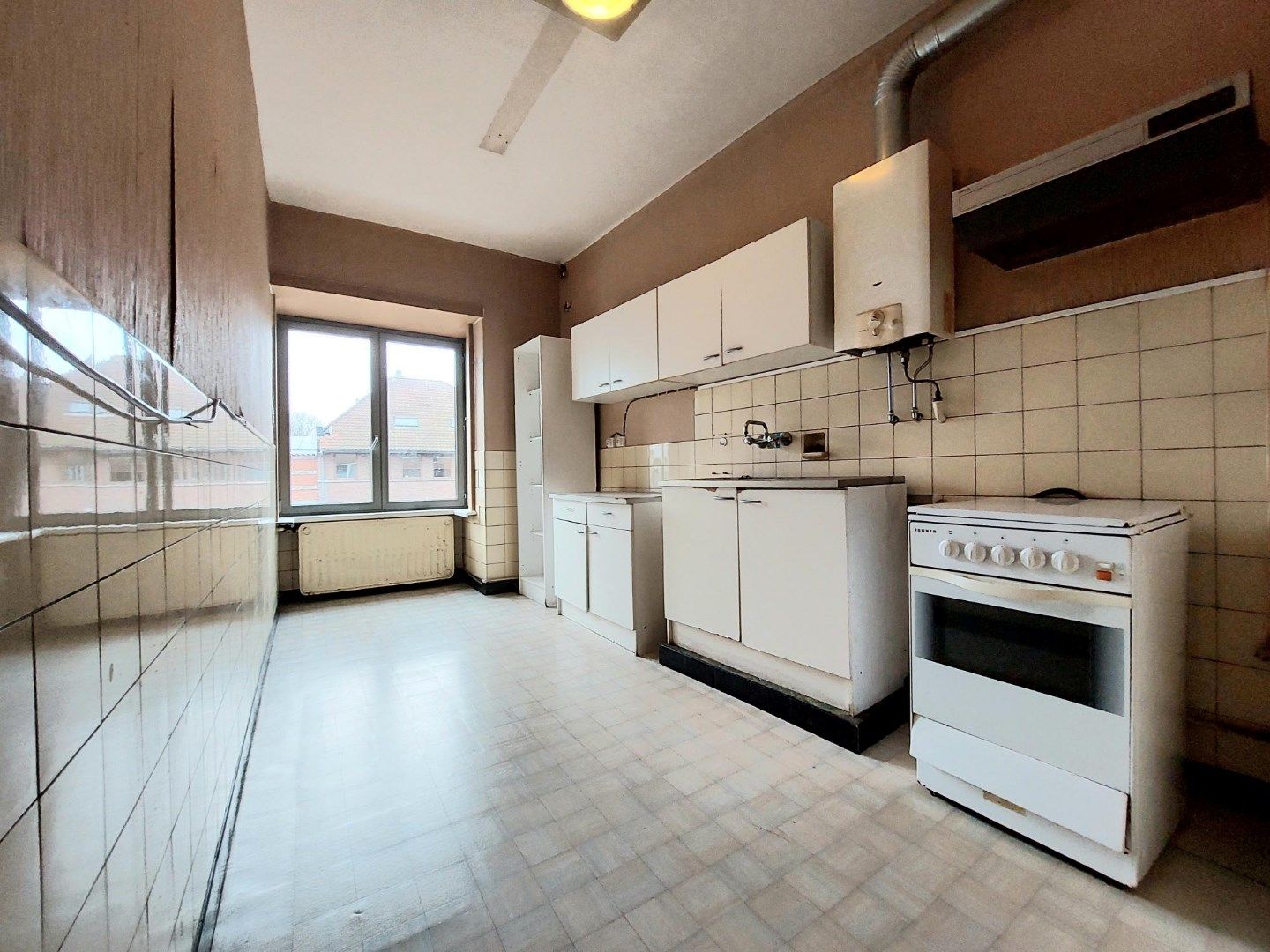 Op te frissen appartement nabij 't Zand foto 6