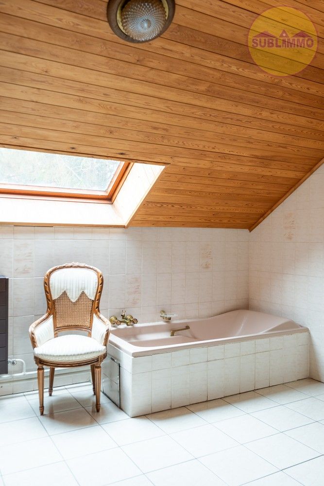 Karaktervolle woning met 6 slaapkamers op een ruim perceel van 21a 73ca foto 16
