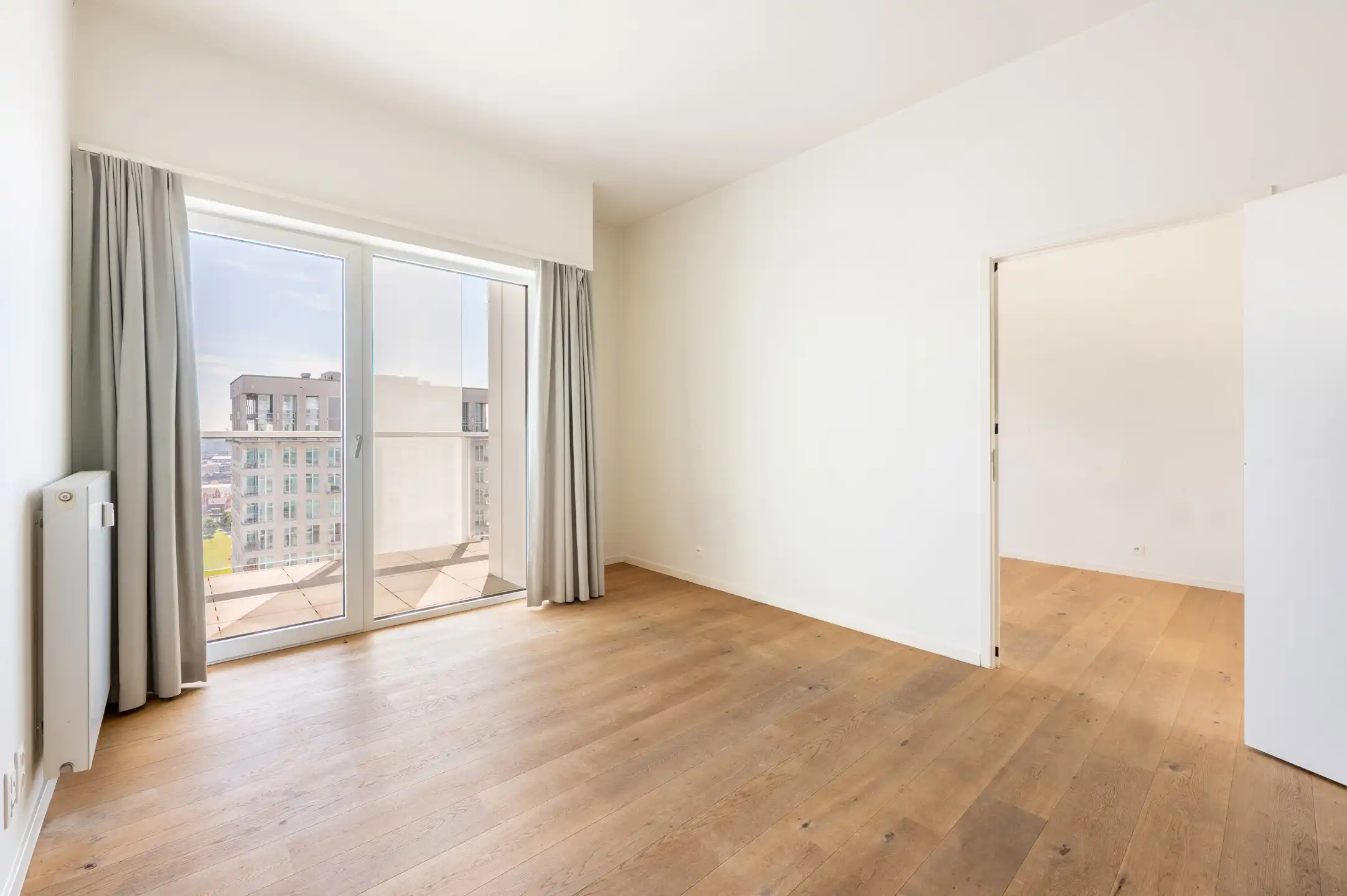Lichtrijk appartement met terras en EPC A foto 9