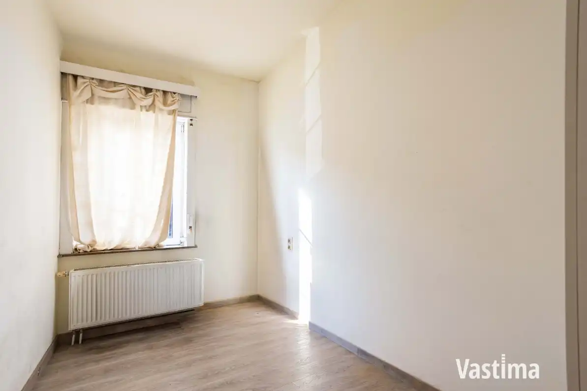 Instapklare stadswoning met 3 slaapkamers, 2 badkamers en tuin foto 9
