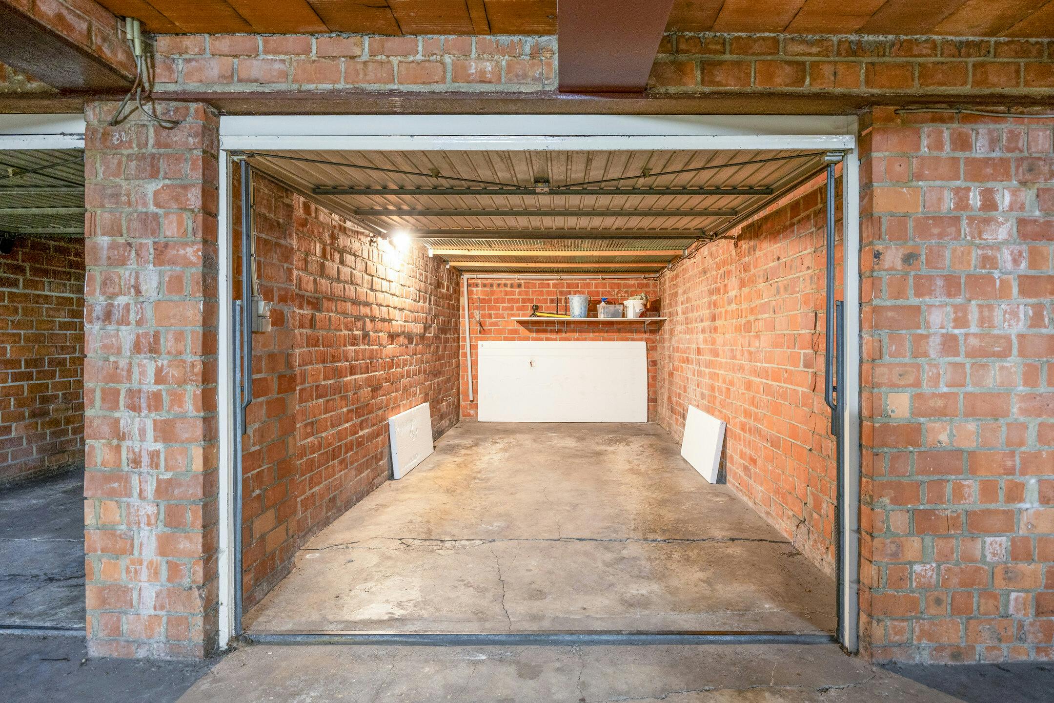 Drie slaapkamer appartement met garagebox en berging in het centrum van Hasselt foto 10