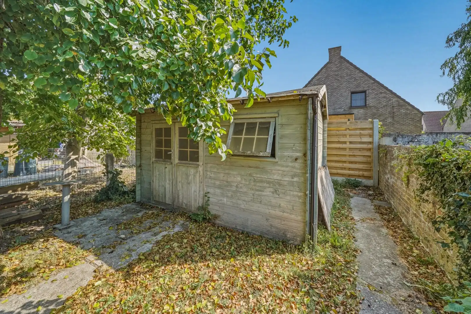 Te renoveren woning met ruime tuin in Bredene foto 11
