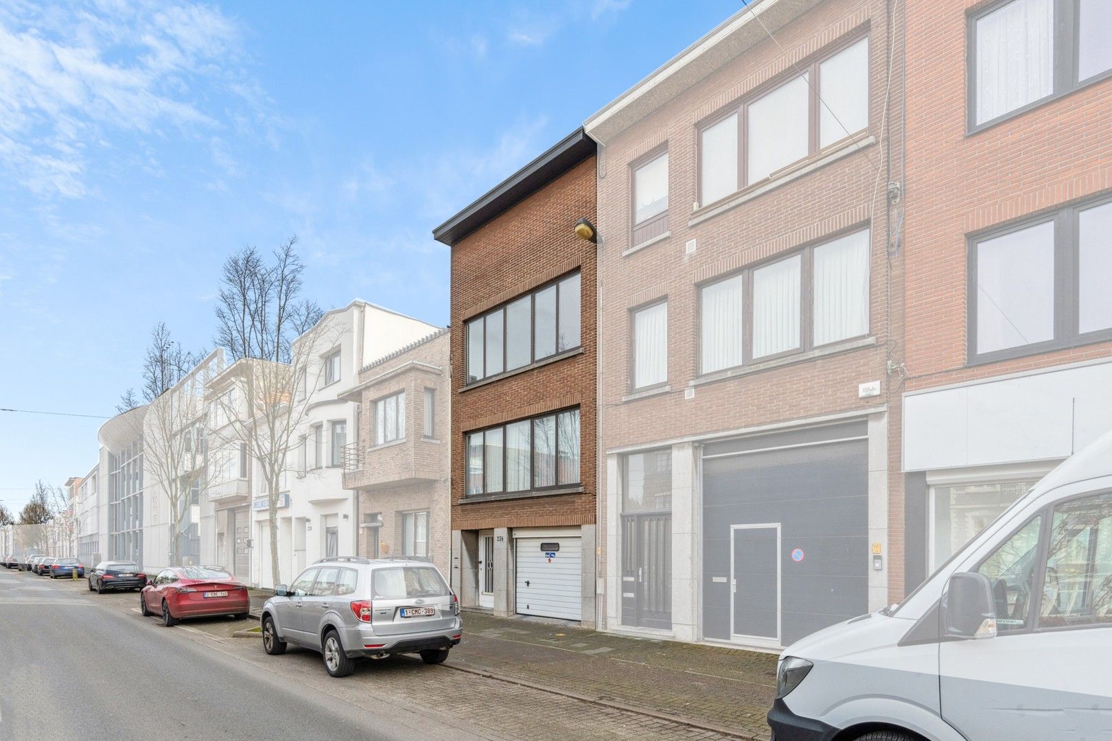 Opbrengsteigendom met tuin en 2 appartementen te koop foto 1