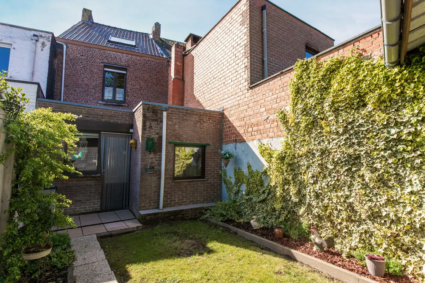 Verzorgde woning met 3 slaapkamers en leuke tuin te Halle foto 13