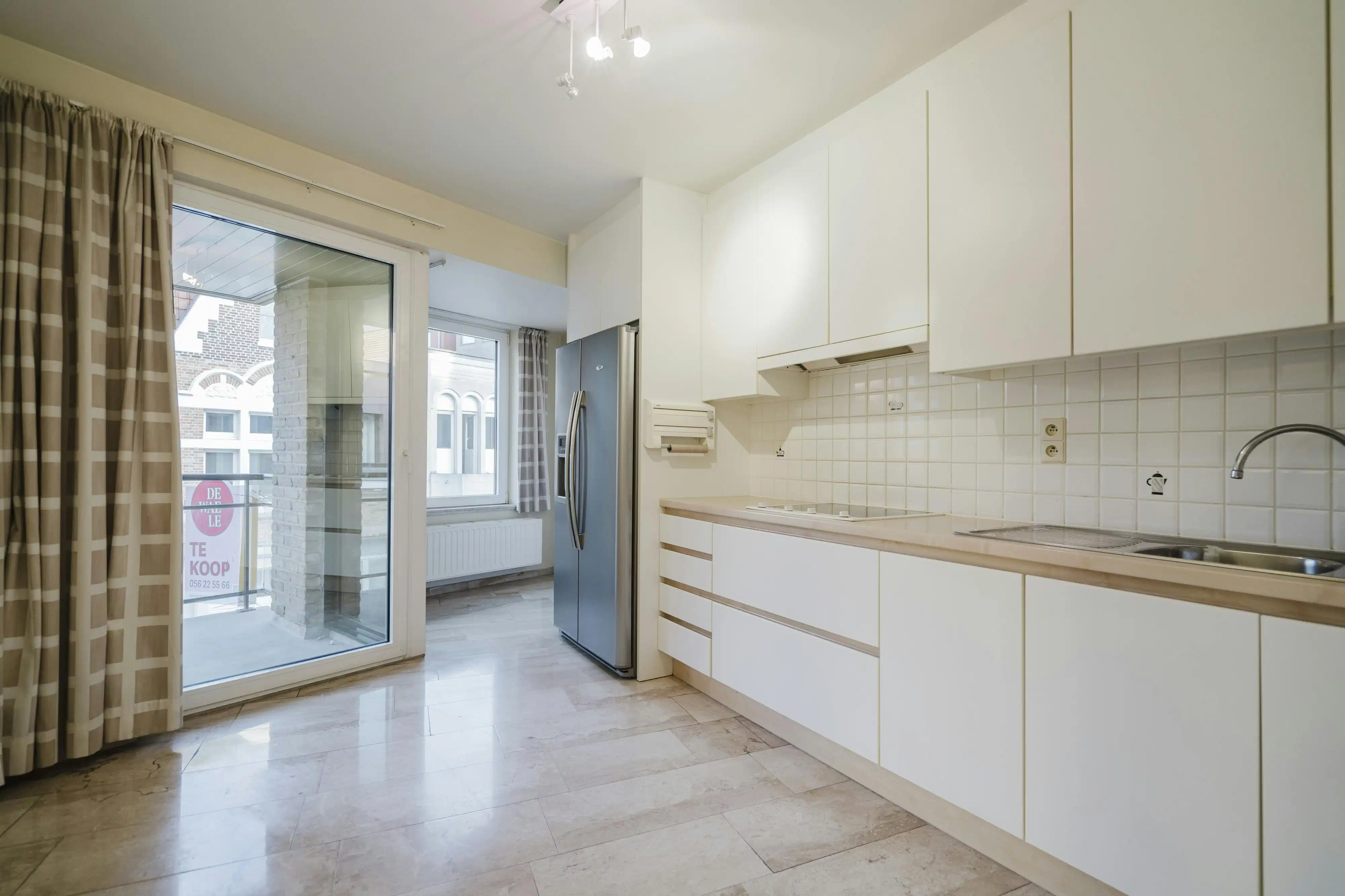 Ruim 3-slpk app. met garage in hartje Kortrijk foto 4