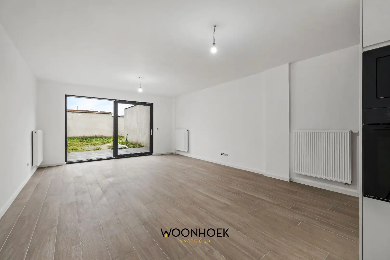 Gerenoveerde, 6-slpk woning, zonnige tuin en 2 bdkms te Sint-Niklaas! foto 2