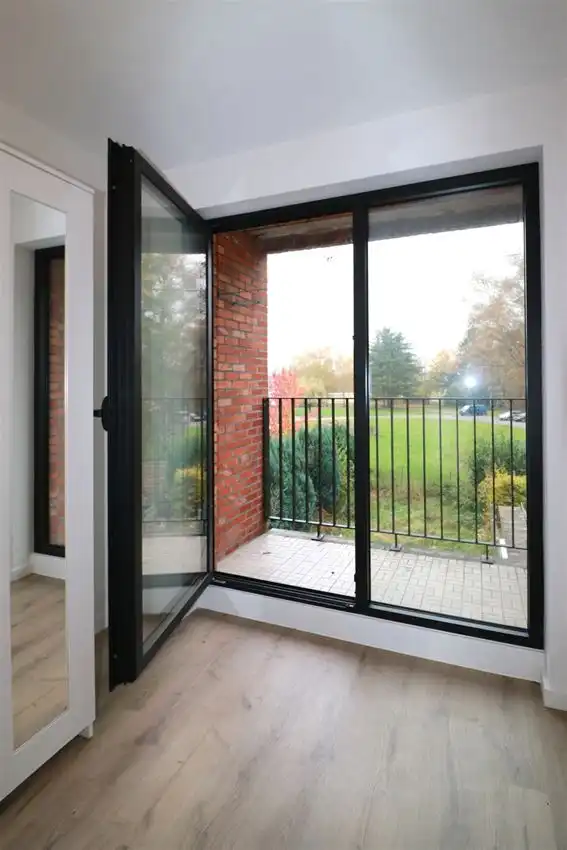 Appartement met 2 slpk, terras, tuin en autostaanplaats foto 18