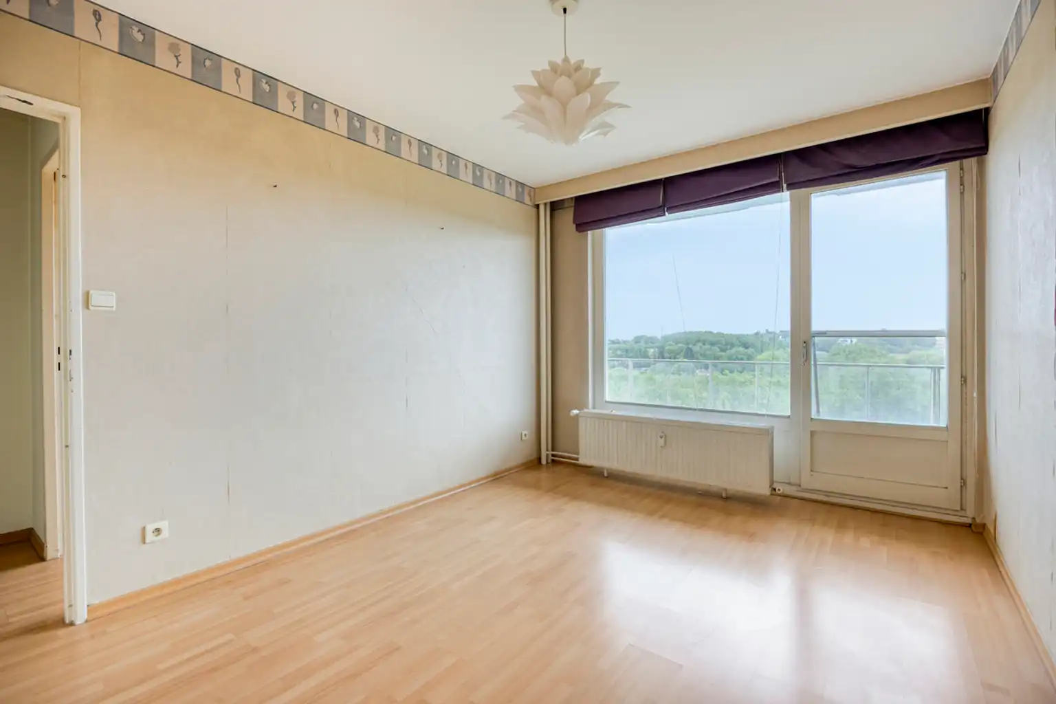 Lichtrijk appartement met open zicht, op te frissen foto 15