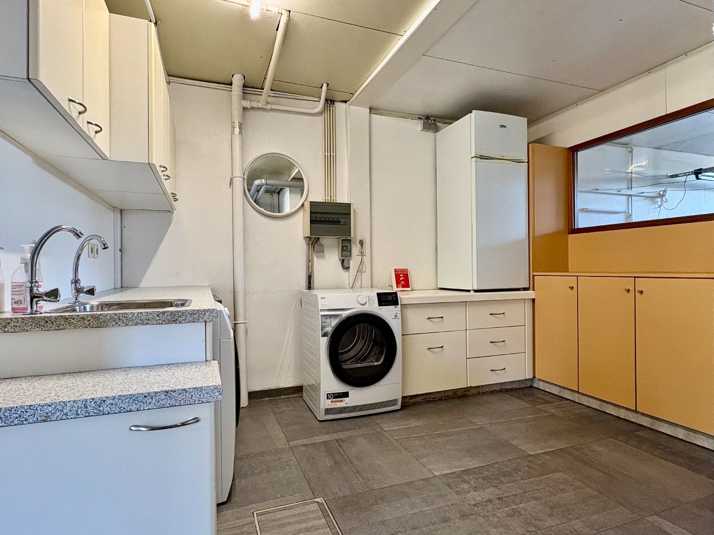 Rustig gelegen woning in een doodlopende straat met tuin en garage foto 5