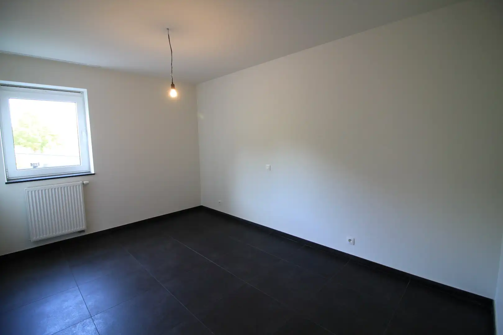 Centraal gelegen appartement met 2 slaapkamers, terras én garage foto 4