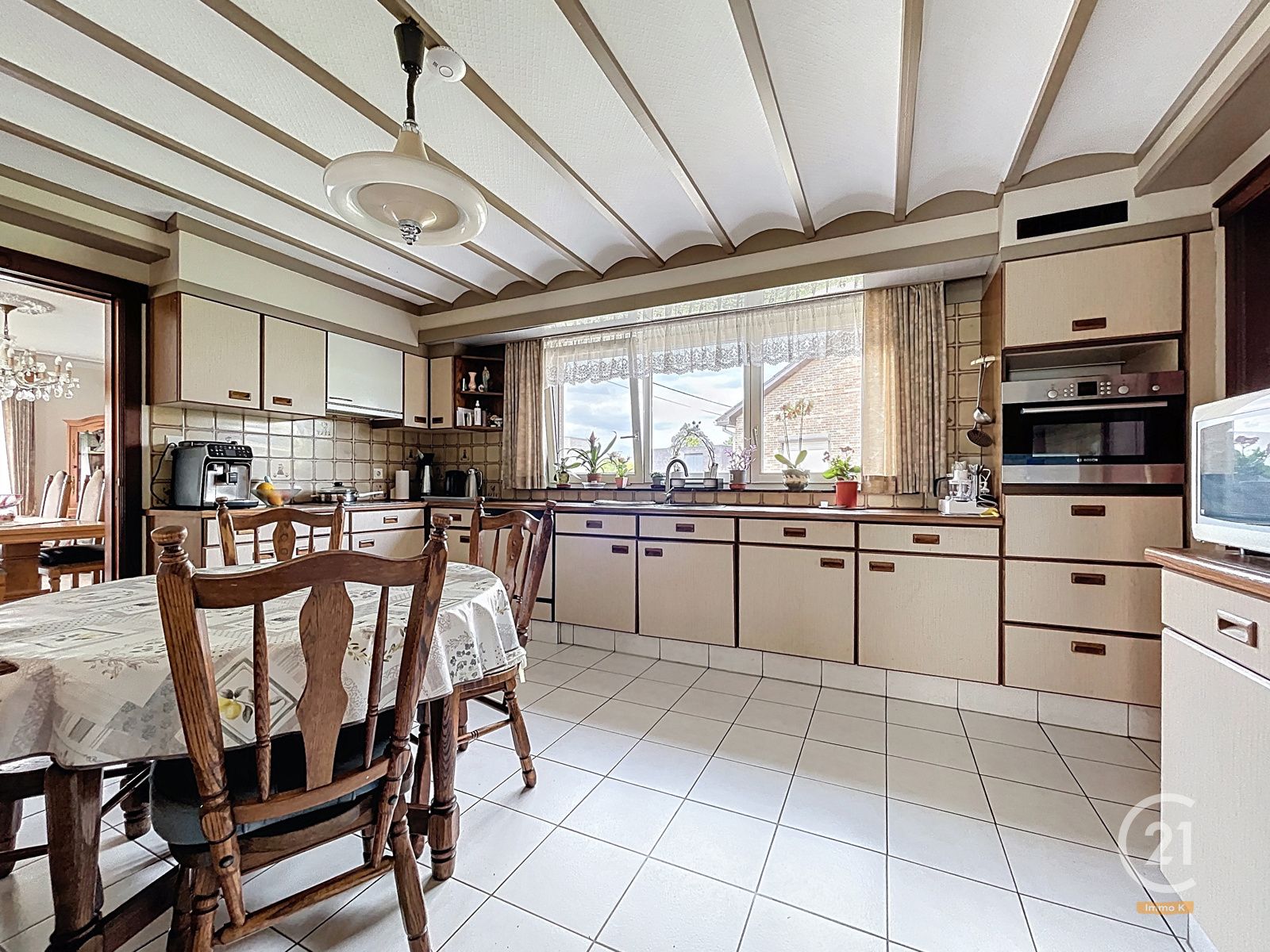Degelijke en onderhouden gelijkvloerse woning met werkhuis foto 13