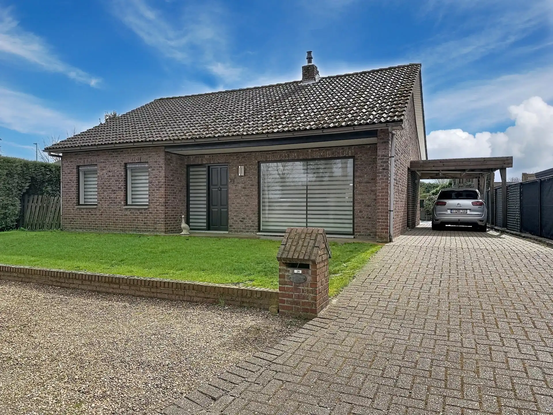Charmante gelijkvloerse woning met 3 slaapkamers en zonnige tuin foto {{pictureIndex}}