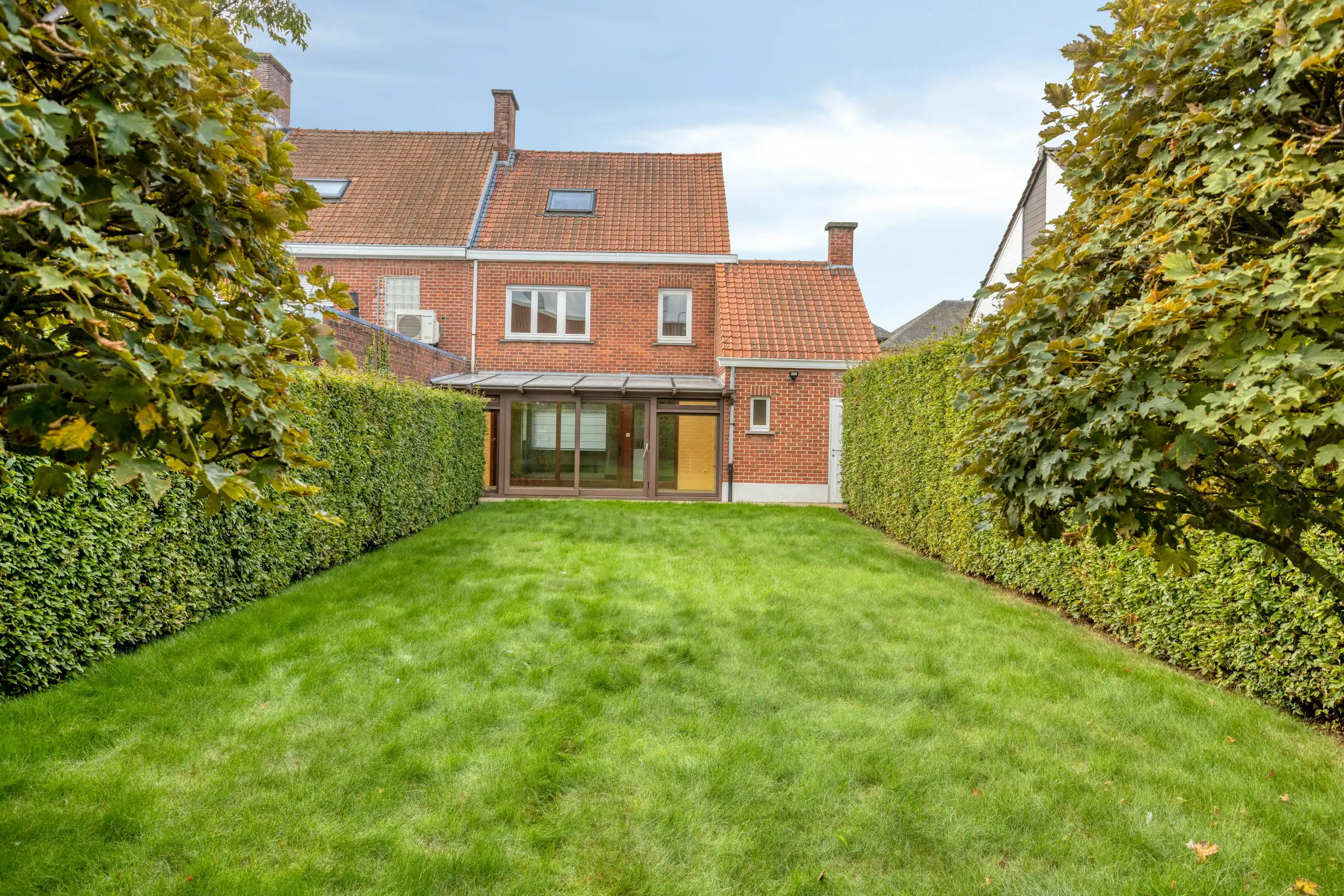 Instapklare halfopen woning met garage en tuin in Roeselare foto 16