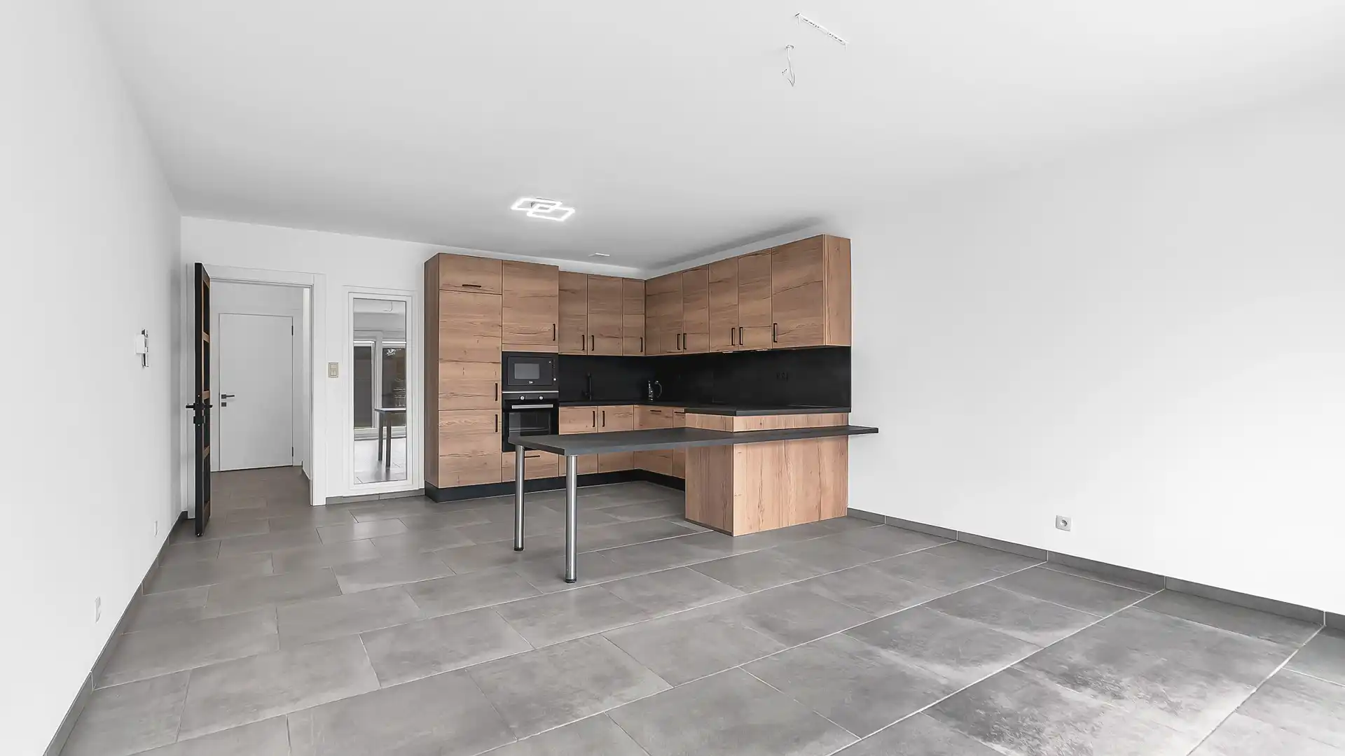 Gelijkvloers appartement met privatieve tuin, volledige onderkelderd en uitzonderlijk gunstig EPC foto 4