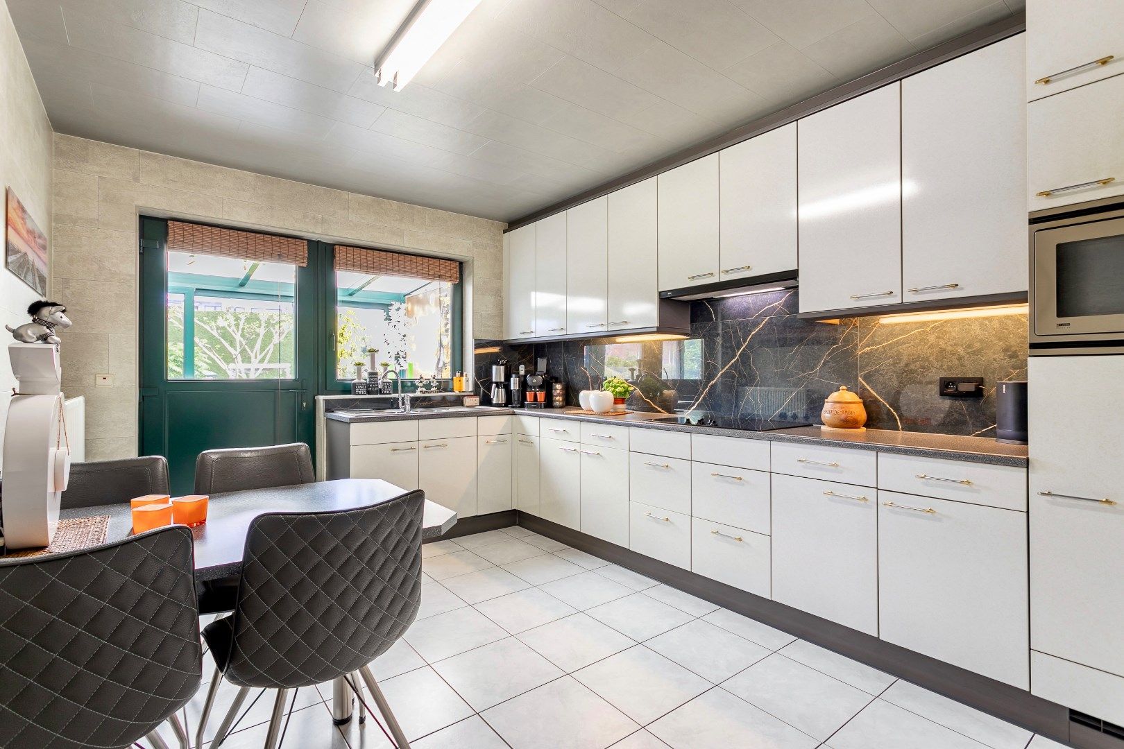 Rustig gelegen, energiezuinige woning op +/- 7a te Buizingen. foto 8