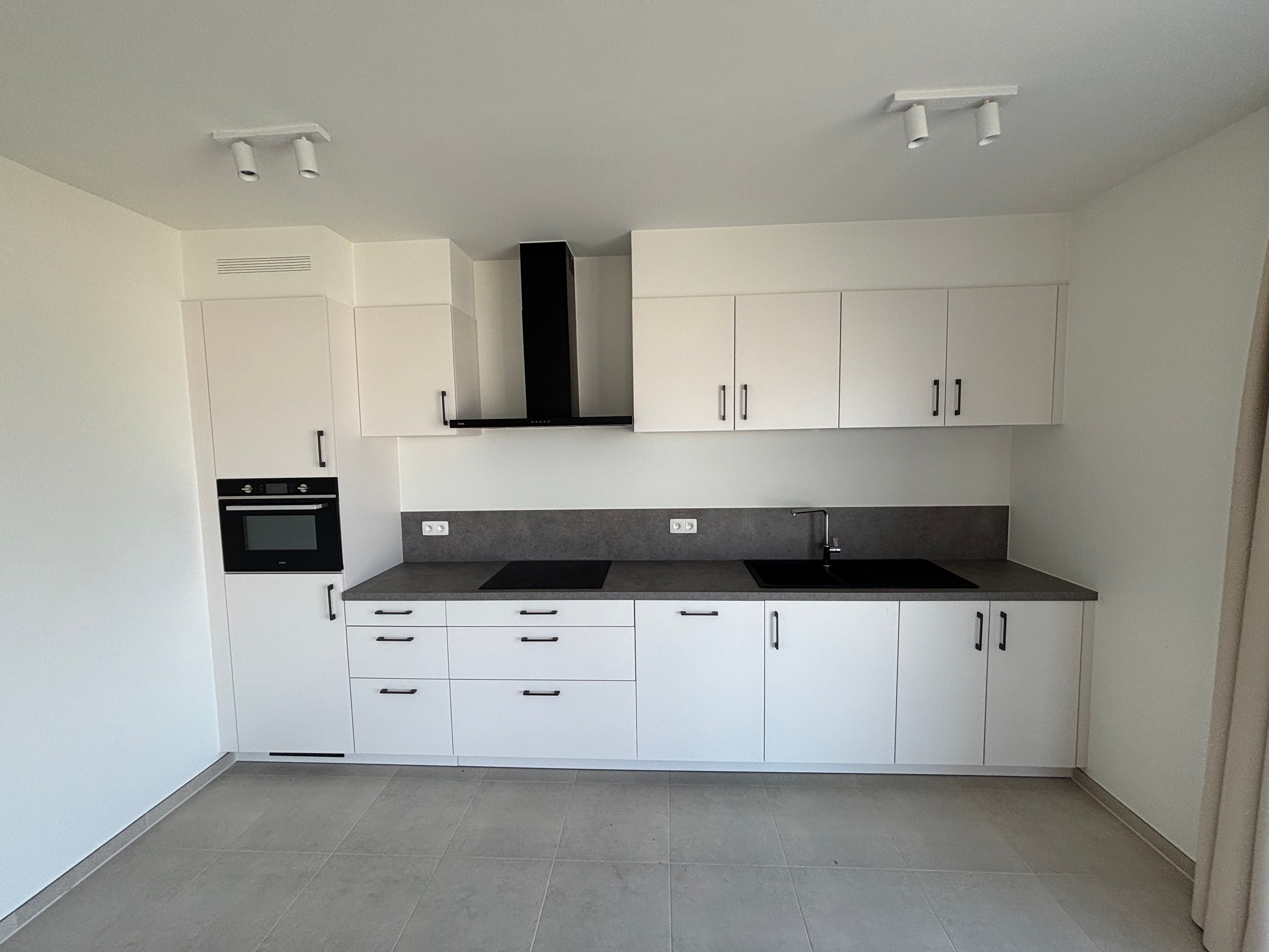 Nieuwbouw 2-slaapkamerappartement met bureau/dressing foto 2