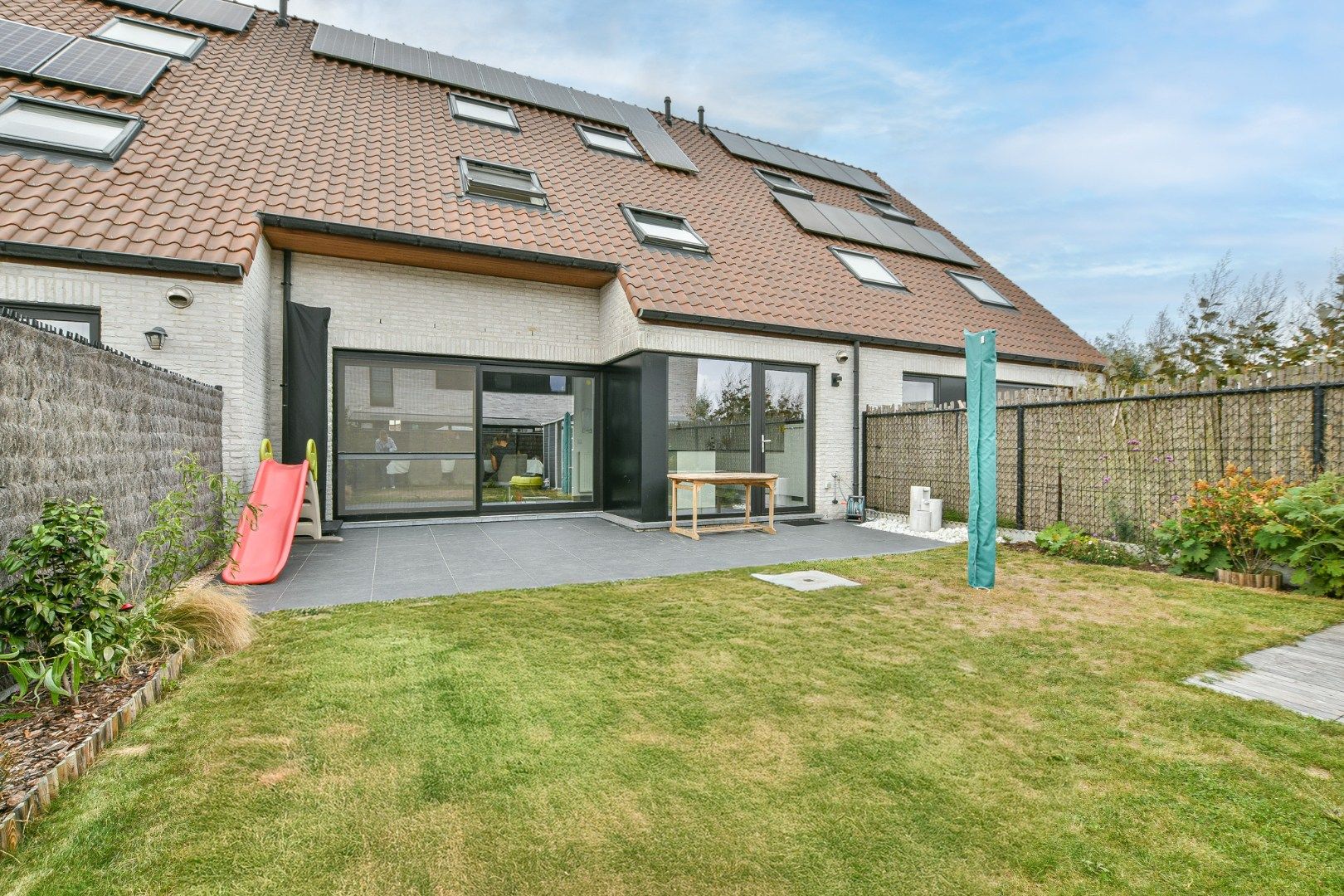 Recente gezinswoning met 4 slaapkamers op toplocatie in De Haan! foto 14