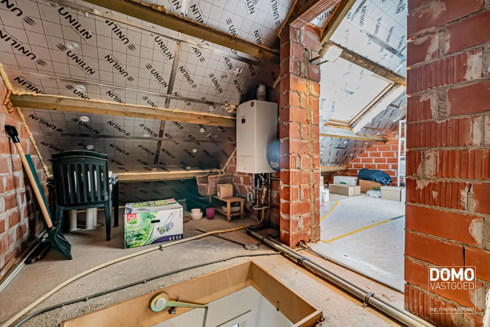 ZUIDWESTELIJK GEORIËNTEERDE DOORZONWONING MET LICHTRIJKE AANBOUW, GEZELLIGE TUIN EN RUIME GARAGE TE KURINGEN (HASSELT)  foto 23