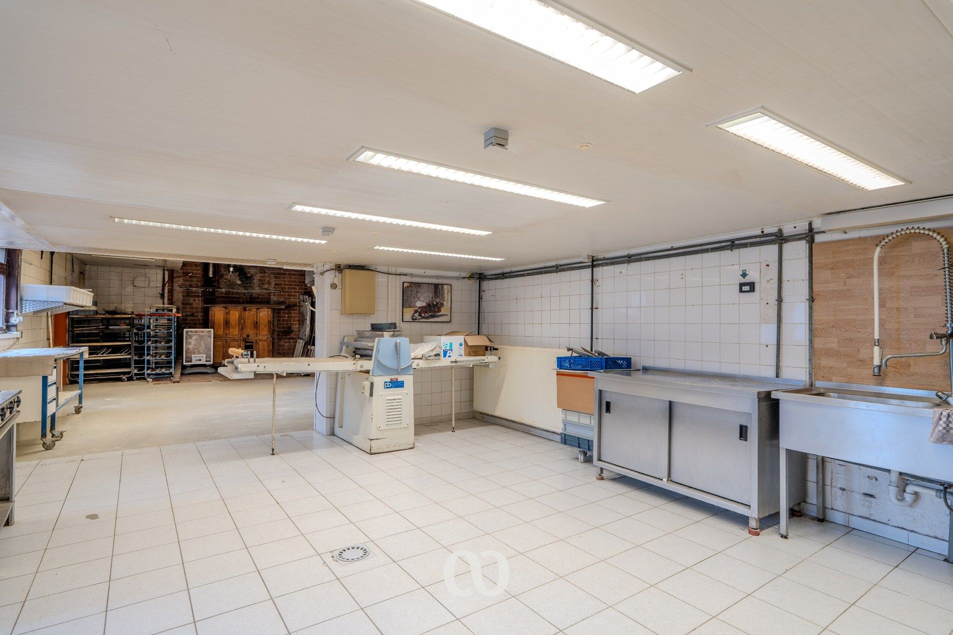 Handelspand met woonst en mogelijkheden in centrum Gavere foto 7