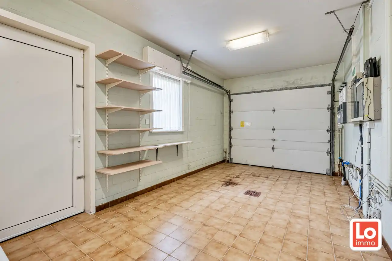 Degelijke open (kangoeroe)woning met inpandige garage en gezellige zuidwest georiënteerde tuin op een rustige locatie nabij het centrum van Lochristi! foto 18