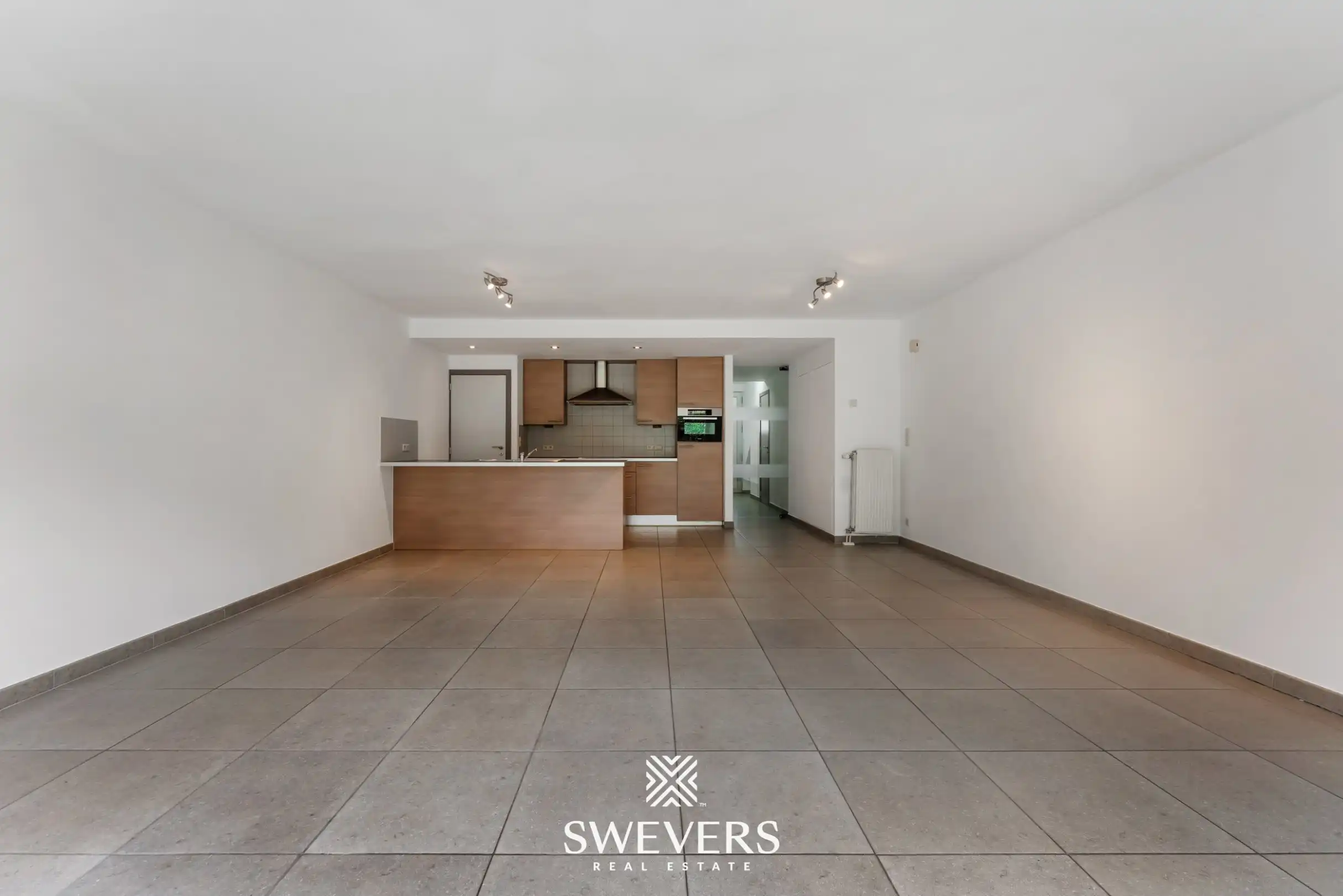 Ruim duplex appartement met 2 slaapkamers en tuin foto 4