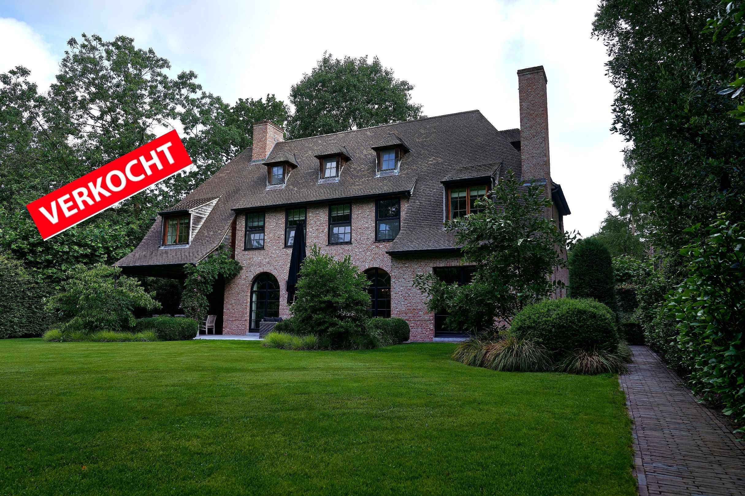 Hedendaagse villa te koop in Schilde foto {{pictureIndex}}
