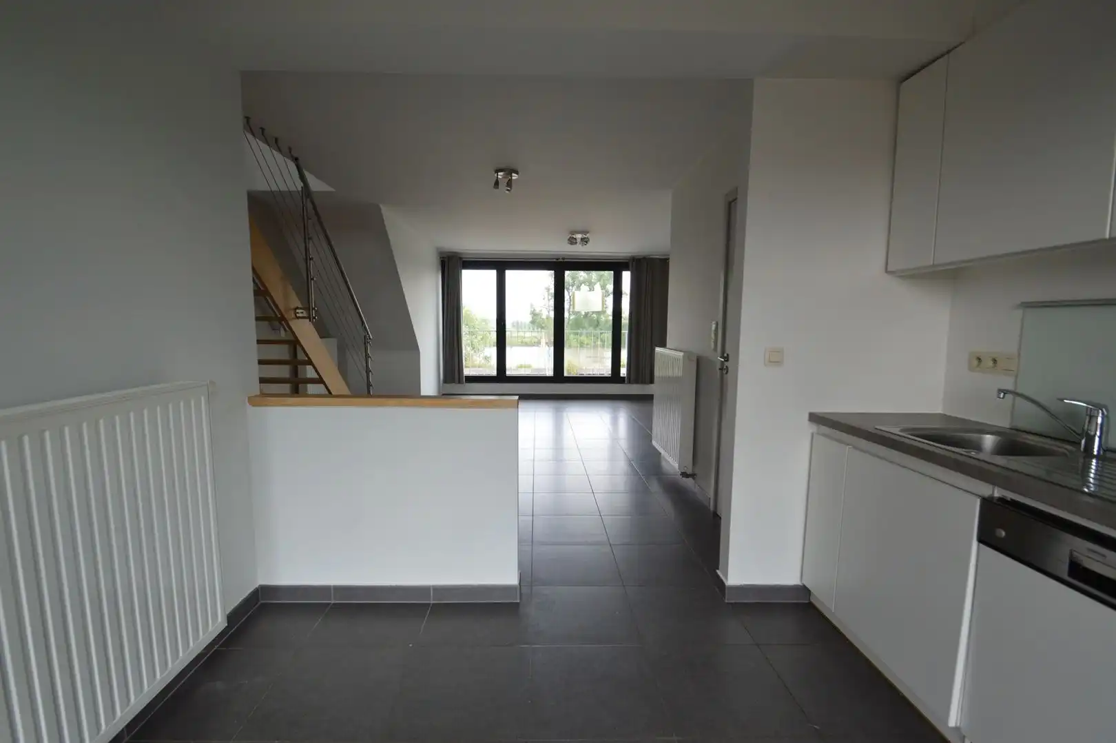 Ruim duplex-appartement te huur te Baasrode aan het water foto 4