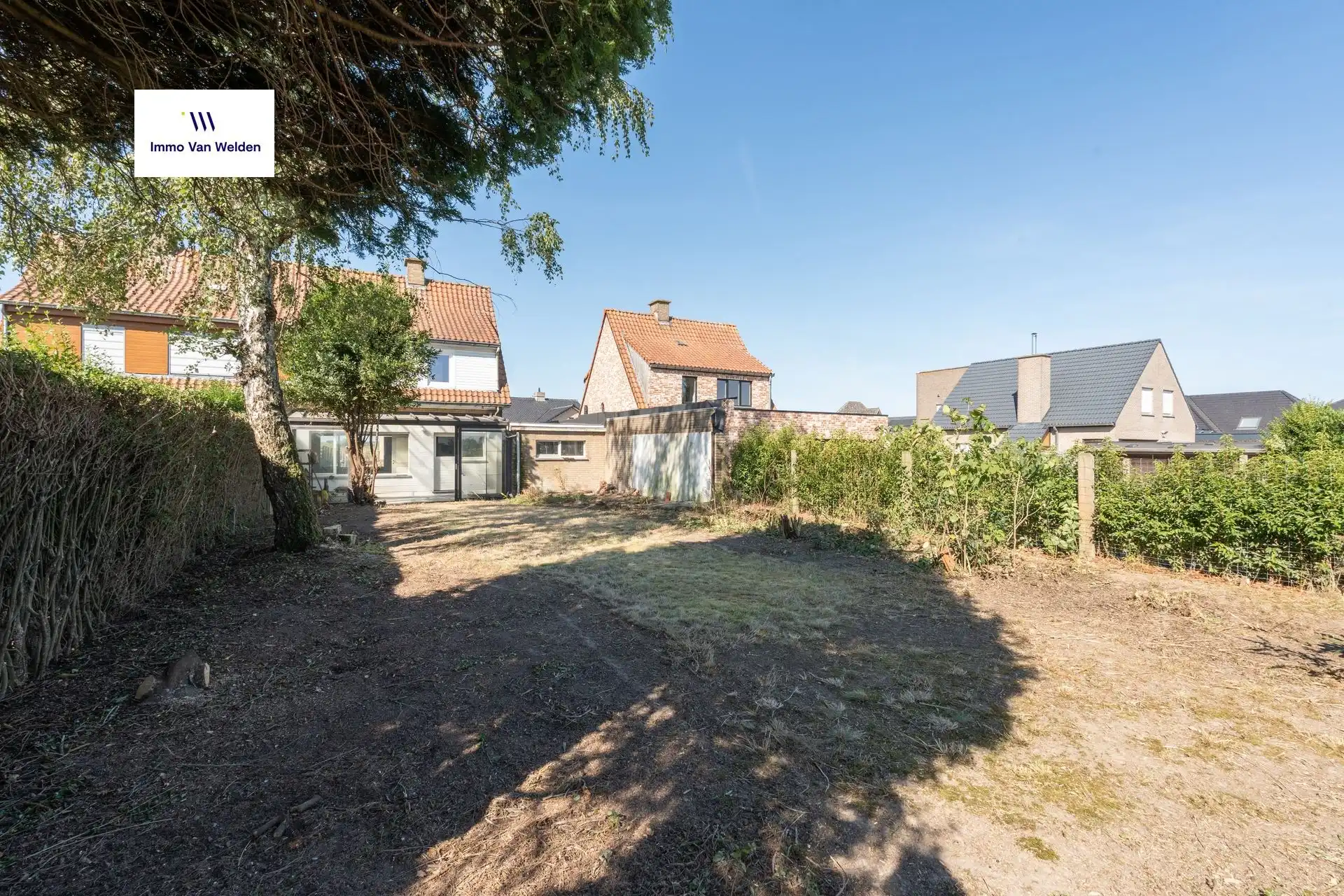 Te renoveren halfopen woning met garage en tuin in landelijke omgeving te Wortegem-Petegem. foto 13