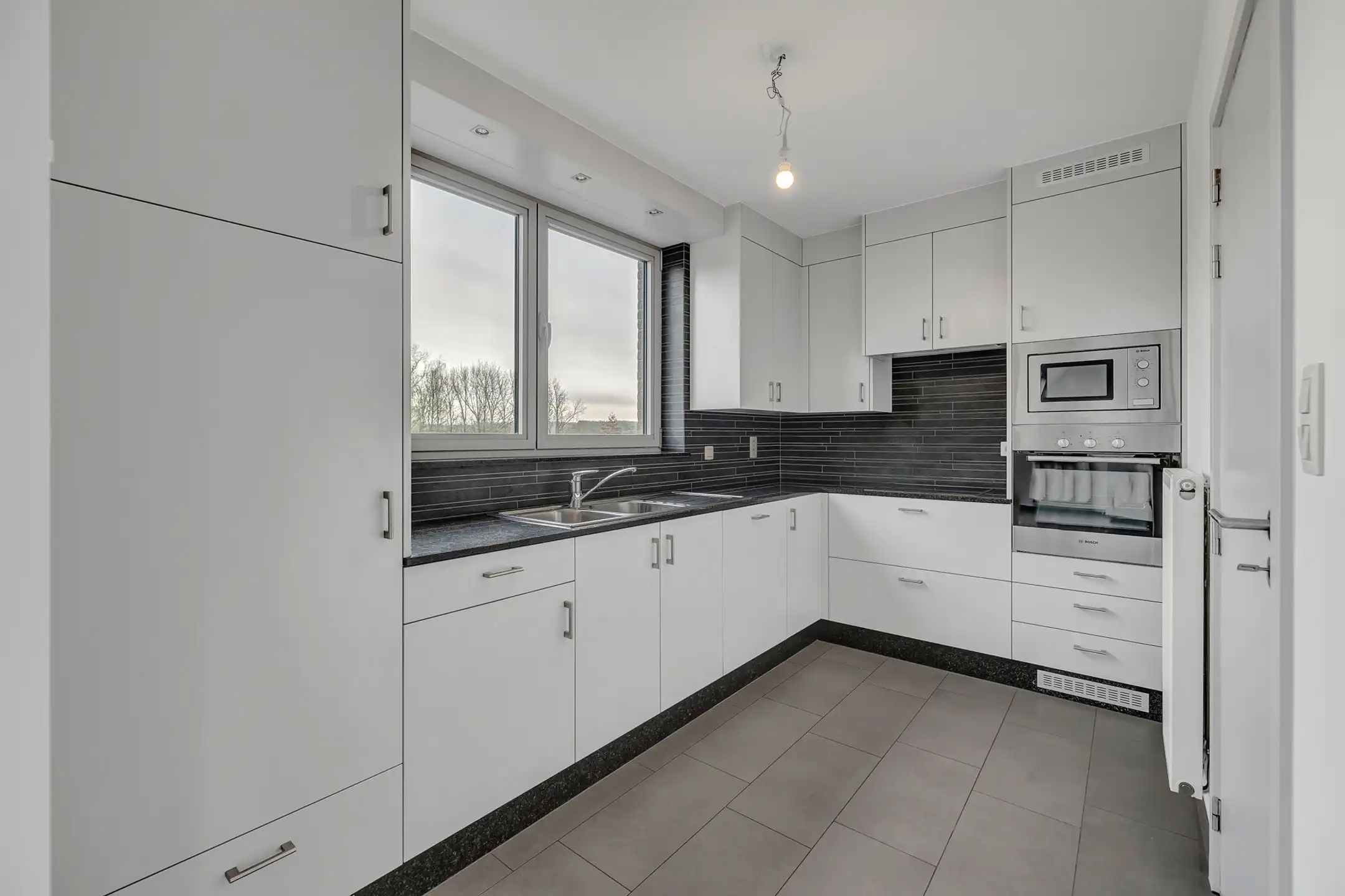 Energiezuinig appartement met 2 slpks, terras en garagebox foto 11