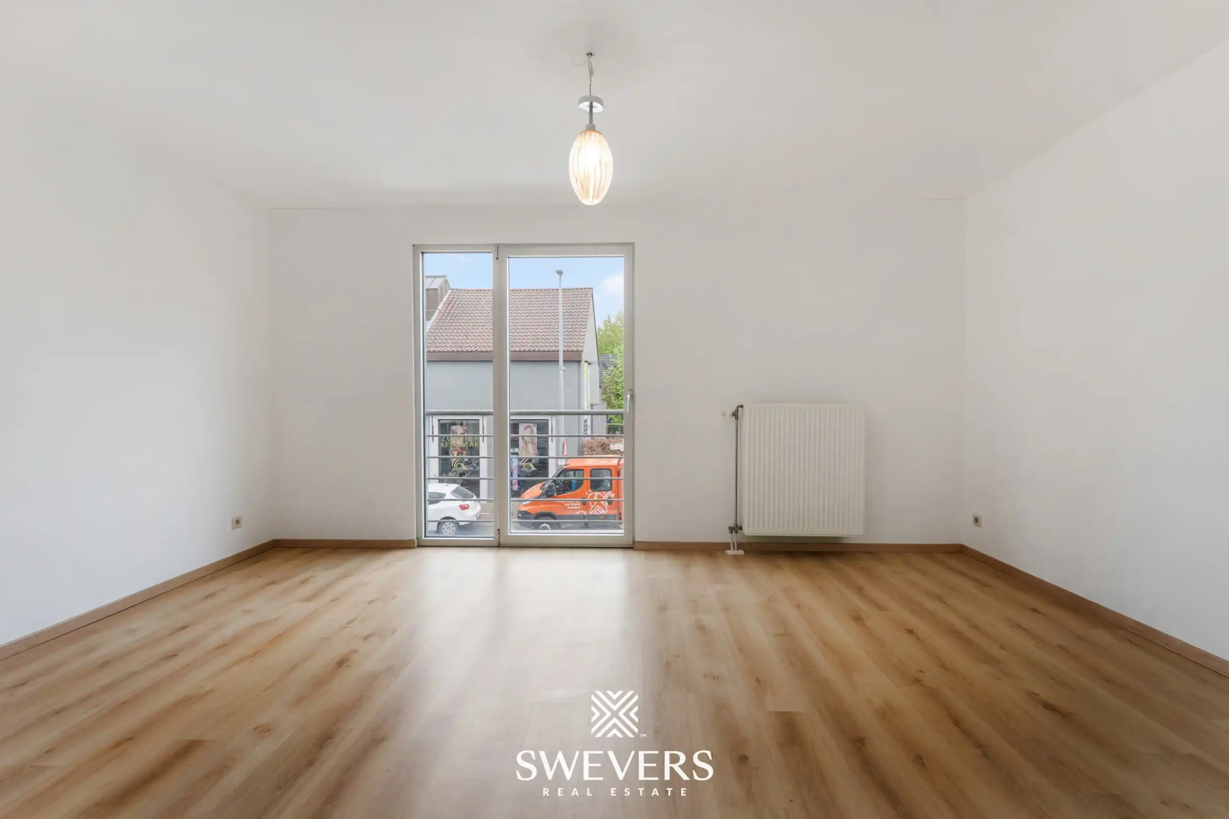 Ruim duplex appartement met 2 slaapkamers en tuin foto 9