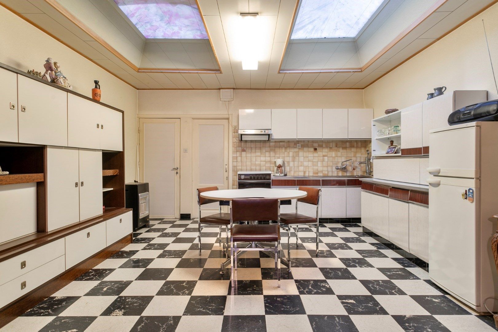 Gezellige te  renoveren woning met tuin in rustige buurt! foto 8