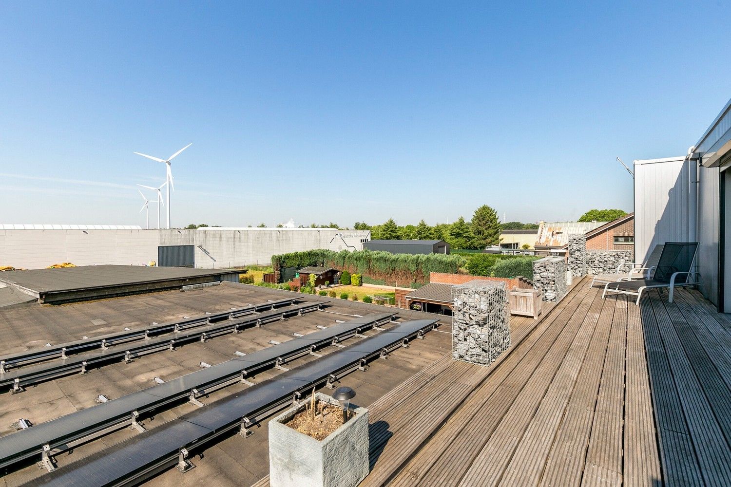 Handelsruimte met luxe duplex-appartement en verhuurde loodsen op het industrieterrein in Lanaken foto 30