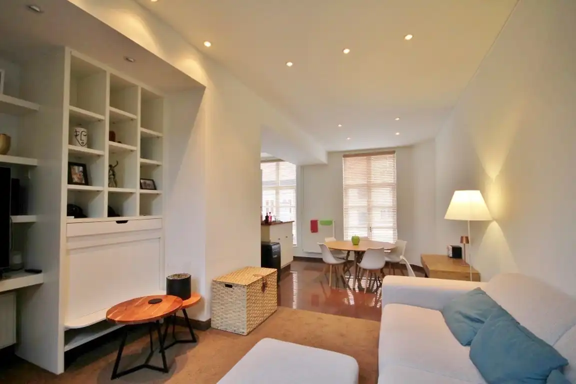 Gezellige triplex op toplocatie met 2 slaapkamers, terras en ondergrondse autostaanplaats foto 10