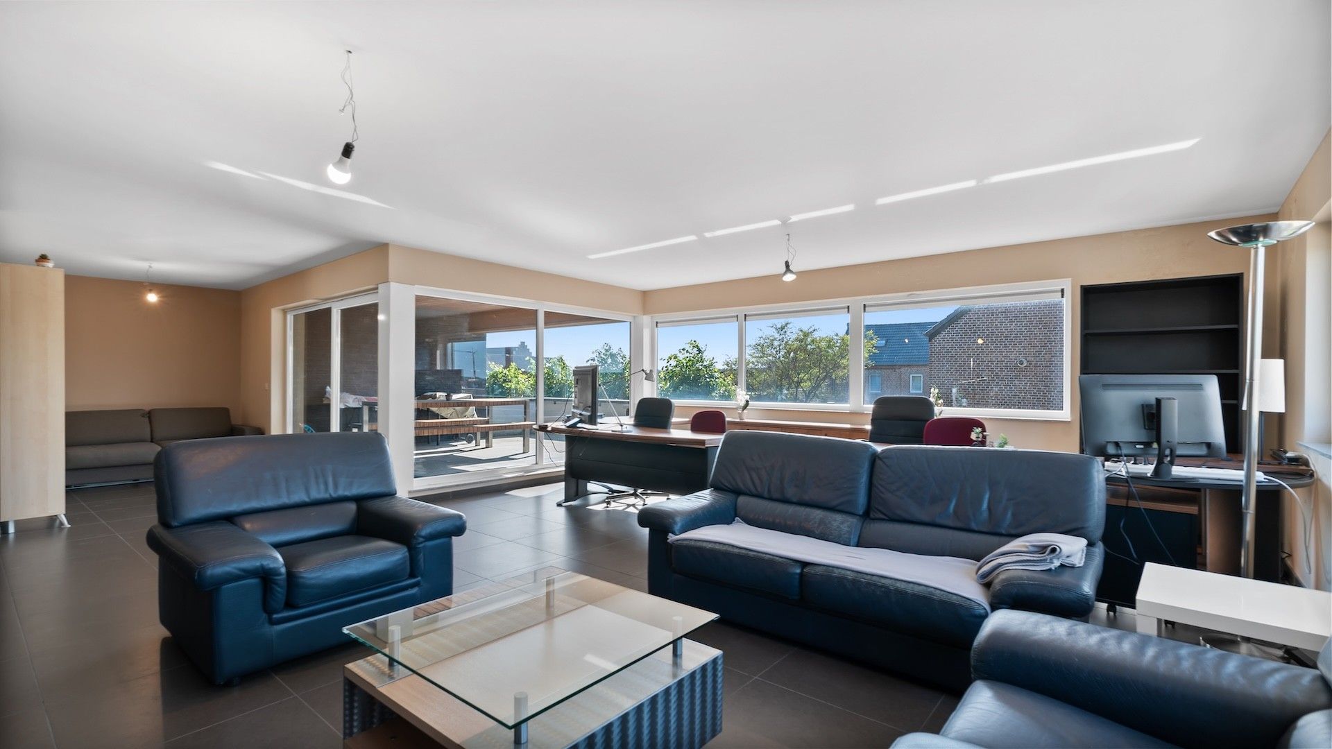 Duplex app. van 220m2 met 3 slpk's en 65m2 aan terrassen foto 5