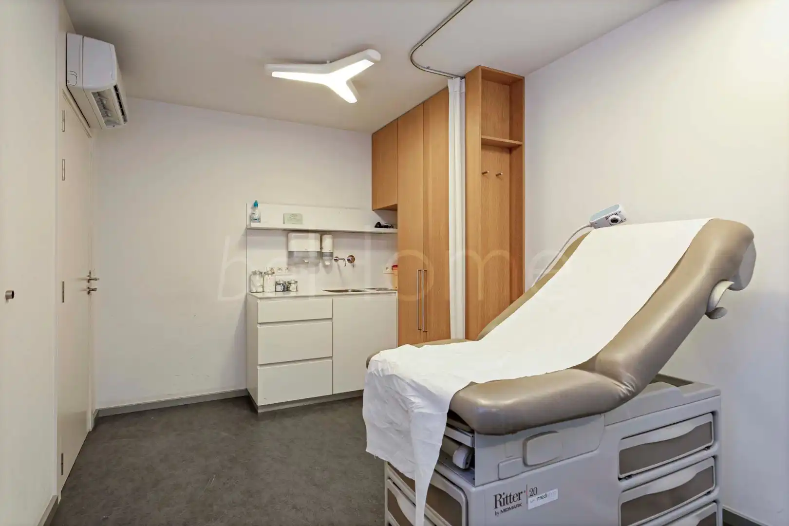 Exclusieve praktijkruimte met drie consultatieruimtes in het centrum van Merchtem foto 12
