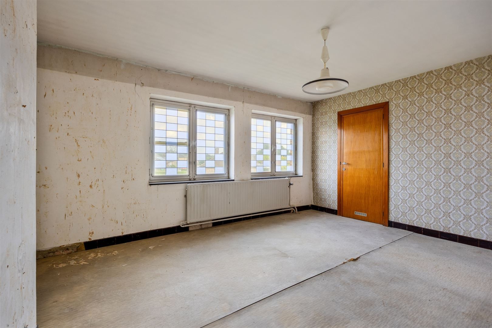 TE KOOP: Te renoveren woning met centrale ligging te Paal!  foto 11