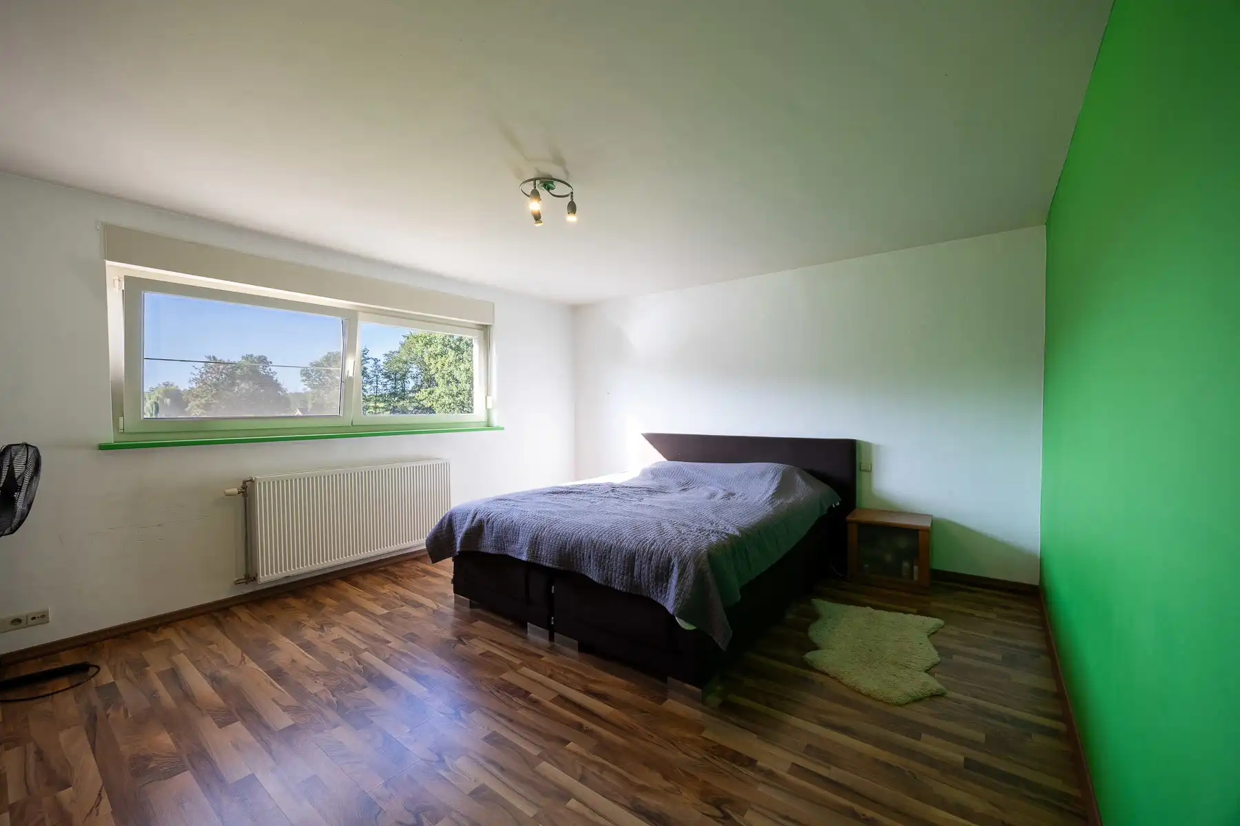 Ruime energiezuinige woning met 6 SLPK's en diepe tuin foto 16
