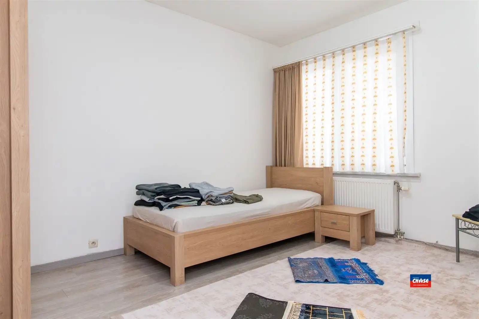 Instapklare rijwoning met vier slaapkamers en twee badkamers foto 16