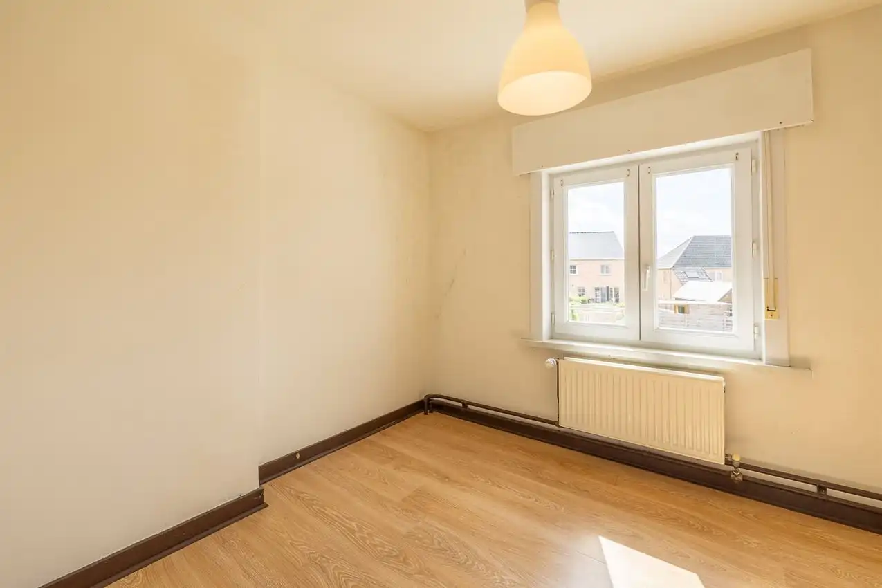 Degelijke gezinswoning met 3slpk, garage, zuid-west gerichte tuin foto 17