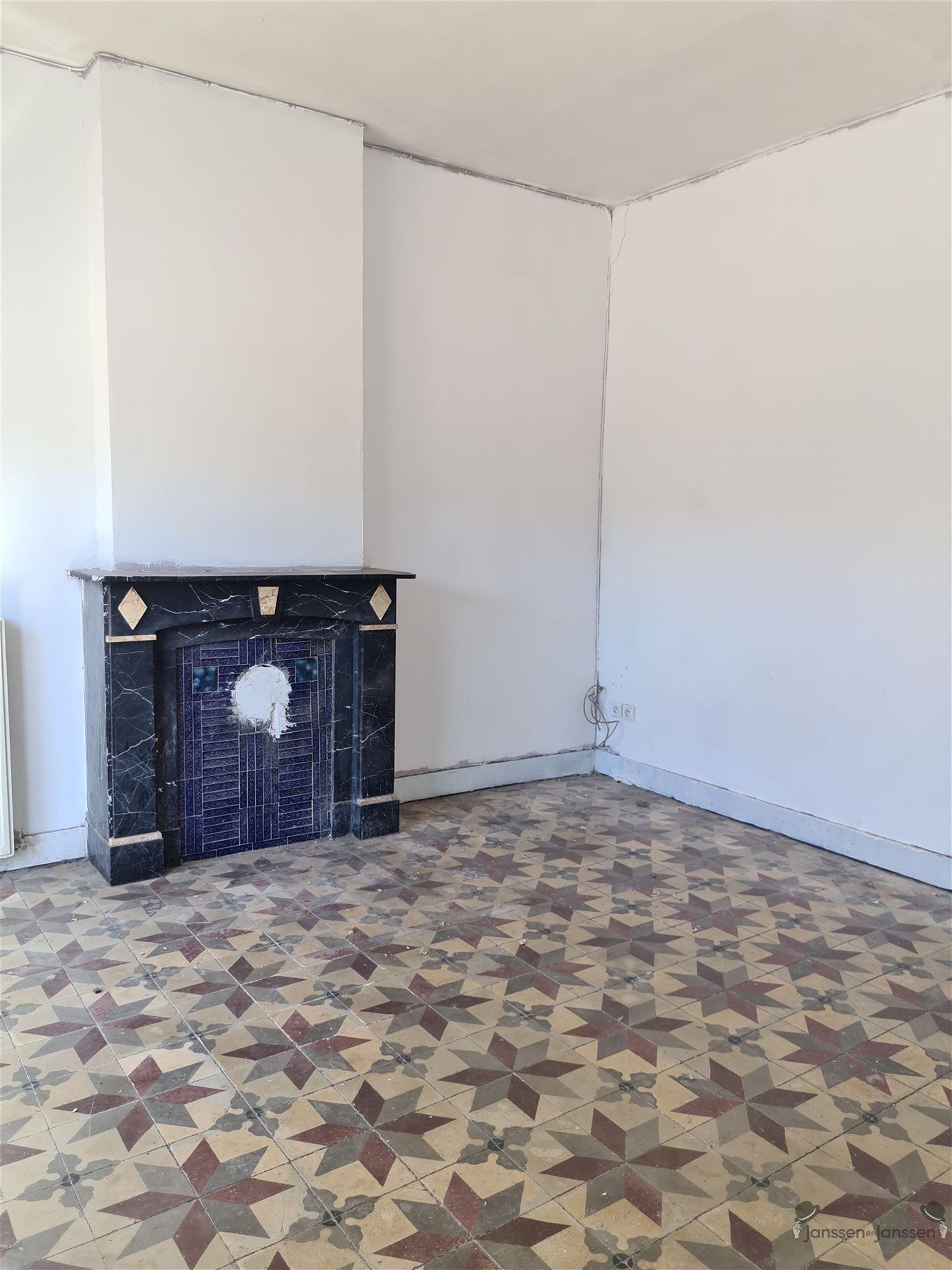 Op te knappen woning met veel potentieel in Tongeren foto 4