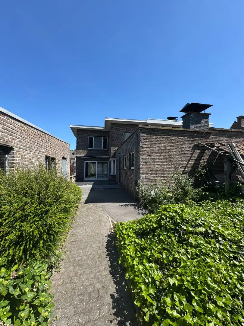 Karaktervolle halfopen woning met zonnige tuin in Balgerhoeke foto 3