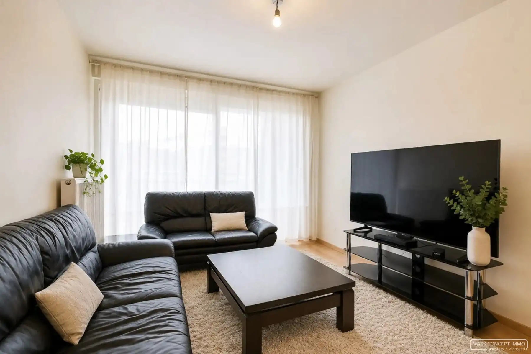 Instapklaar 2-slaapkamerappartement met terrassen in hartje Waregem foto 3