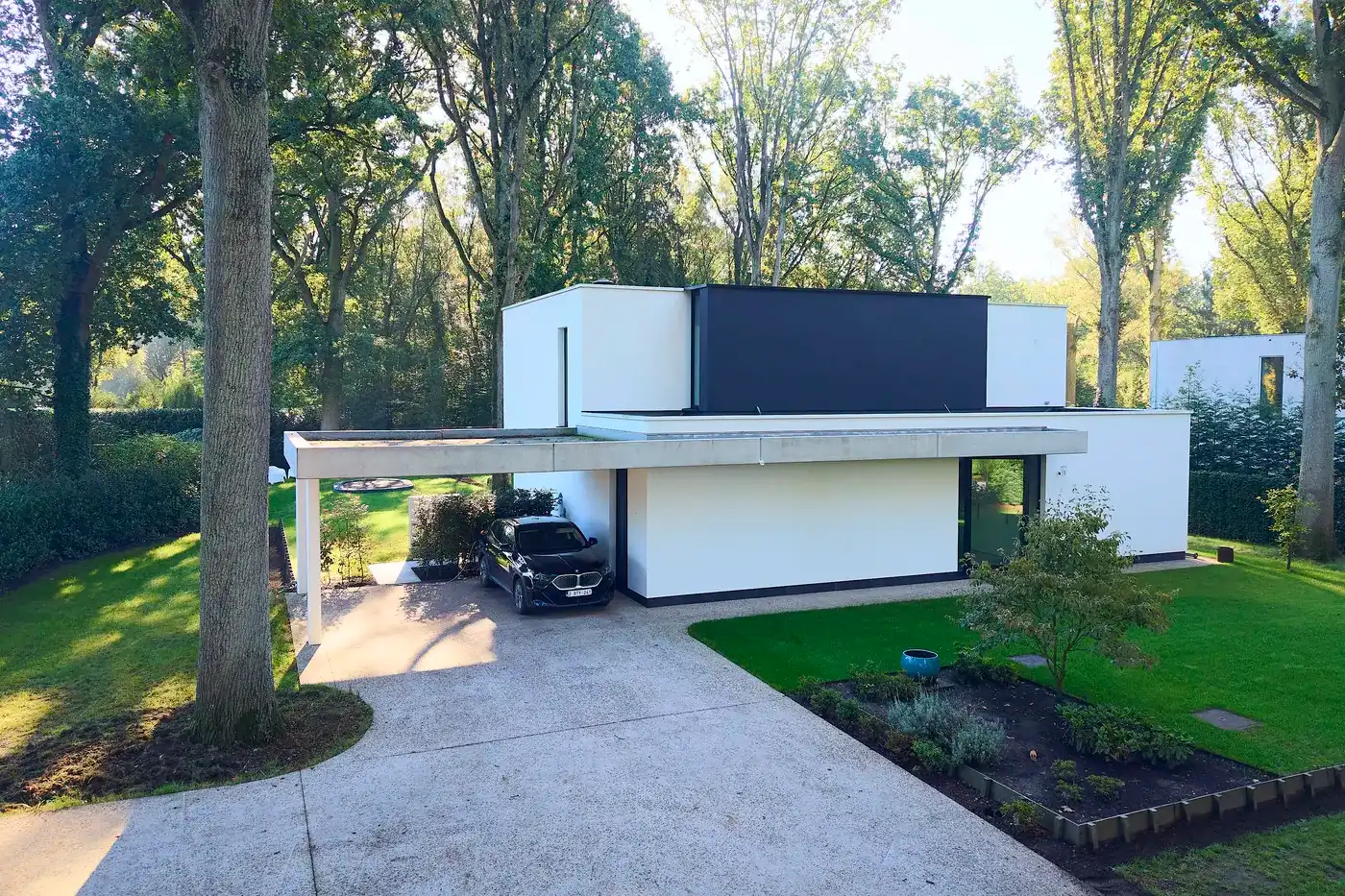Moderne gezinswoning met ruime tuin, carport en drie slaapkamers en 2 badkamers in het hart van ’s Gravenwezel foto 32